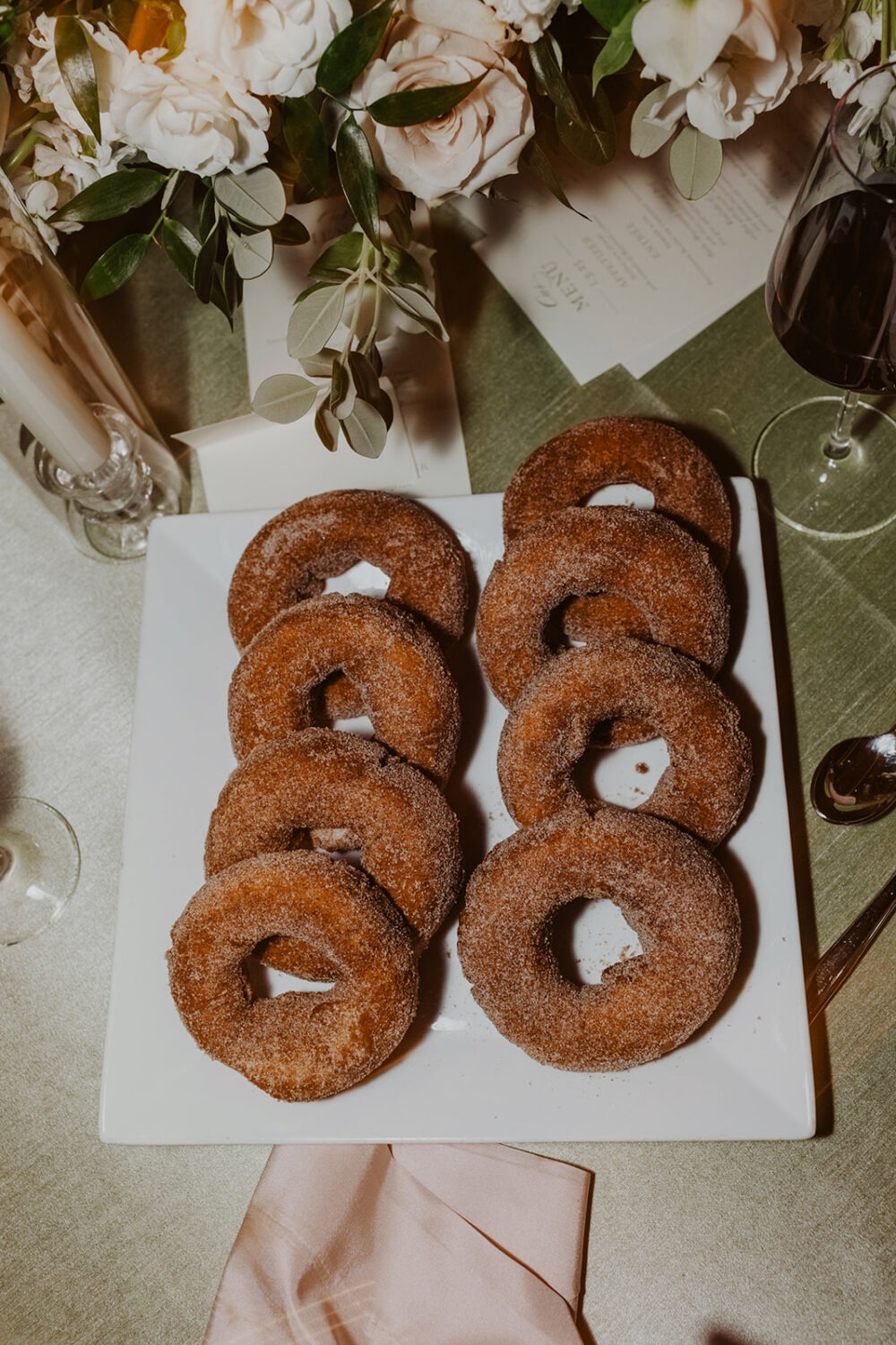 row of donuts at wedding reception