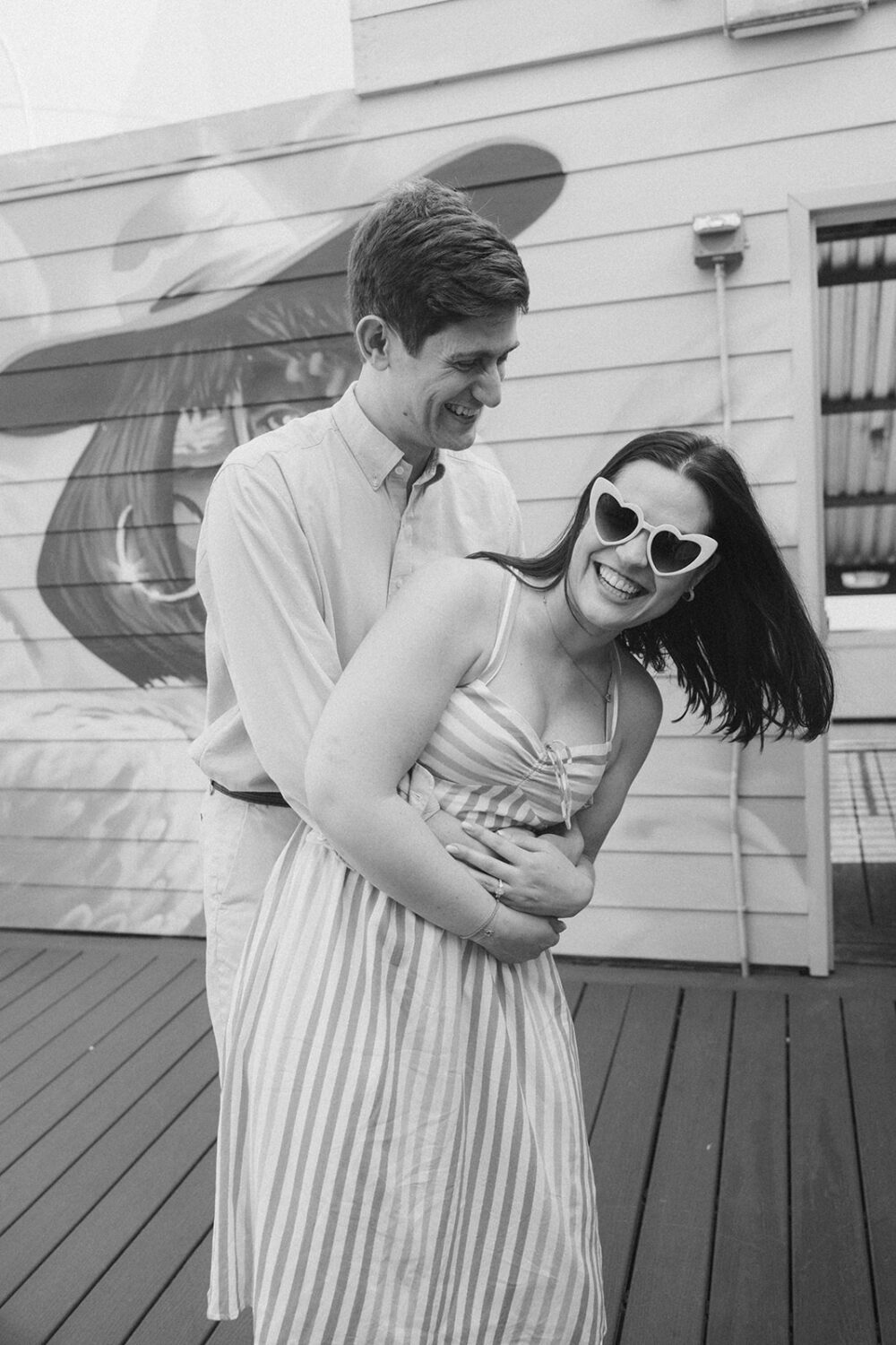 couple embraces during engagement shoot