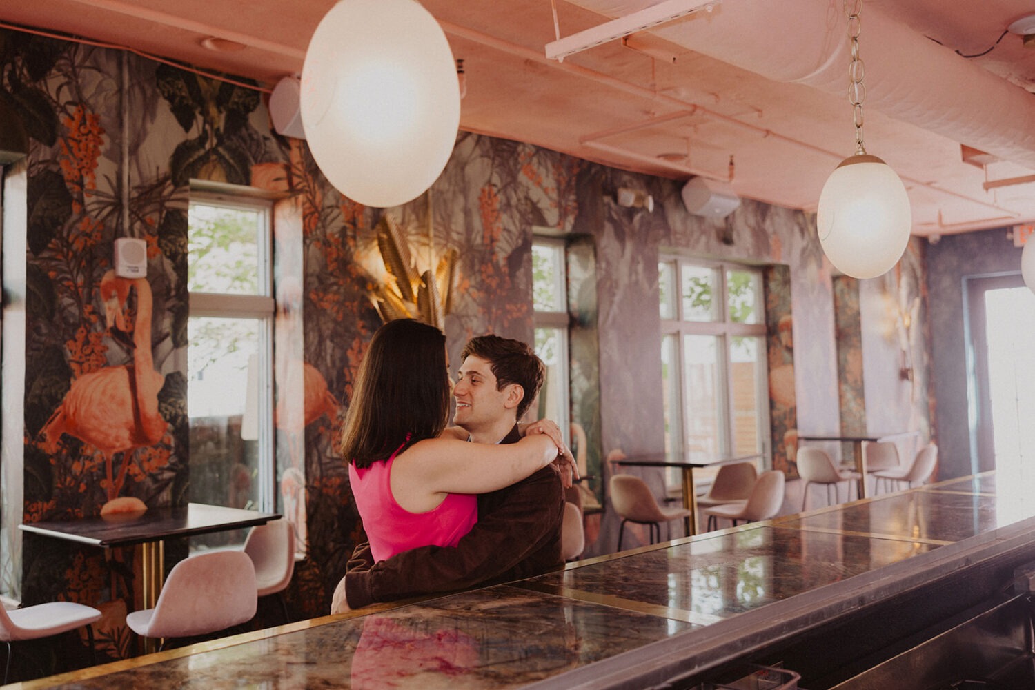 couple embraces during engagement shoot