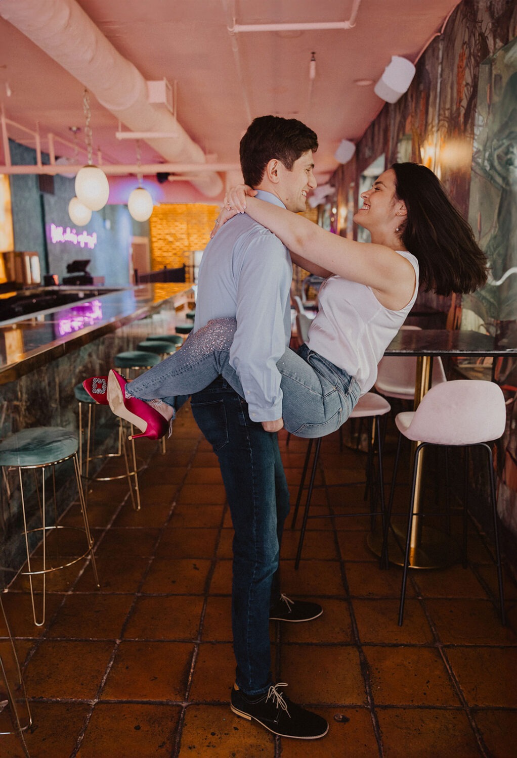 couple poses during engagement shoot