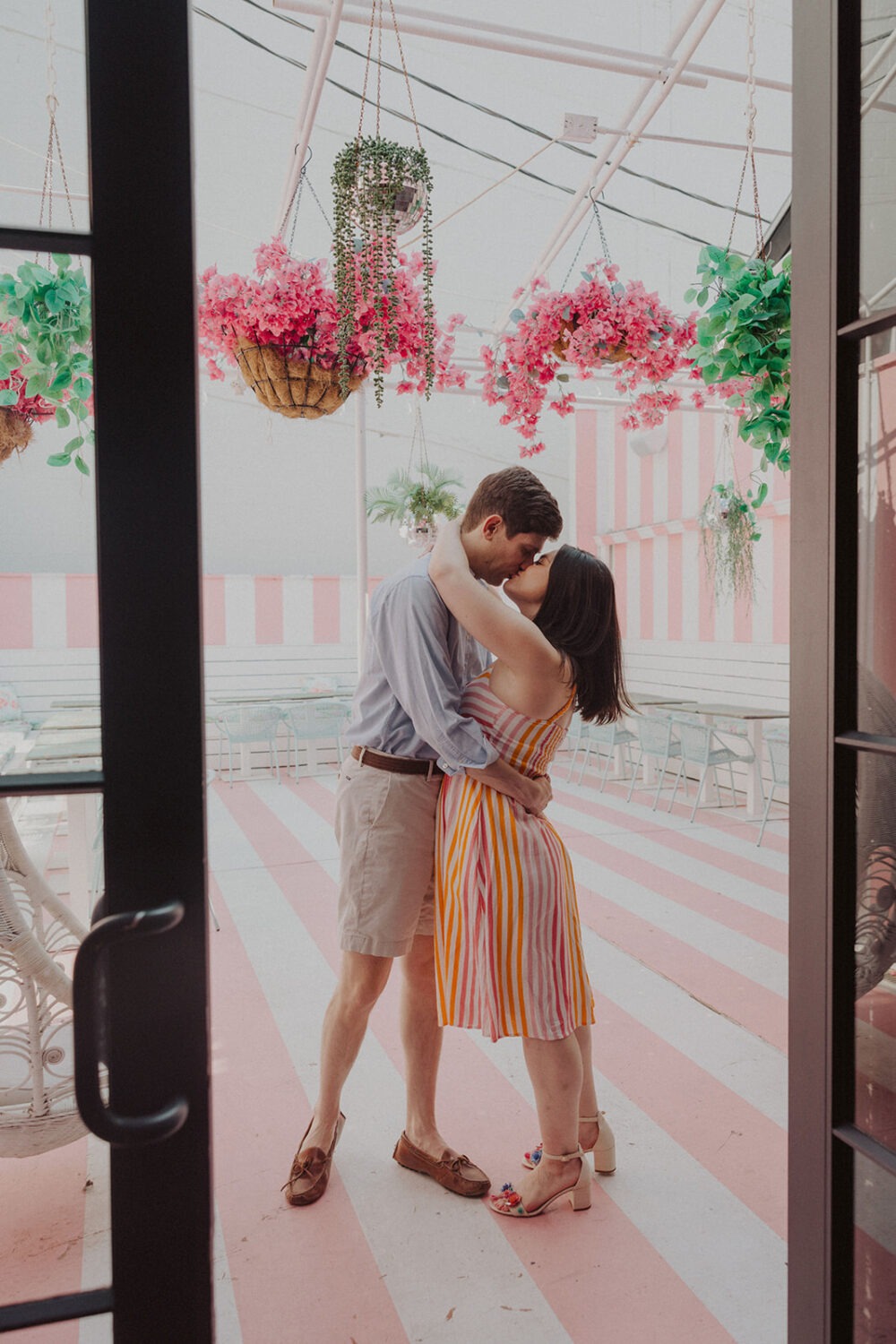 couple kissing during engagement shoot