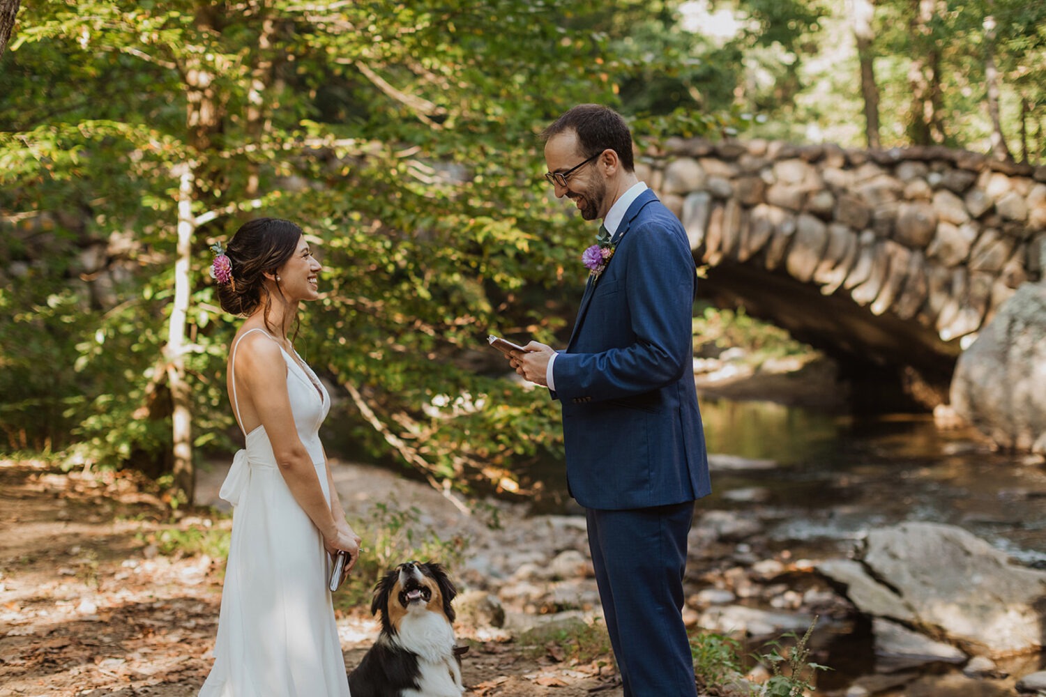 couple reading vows to each other 