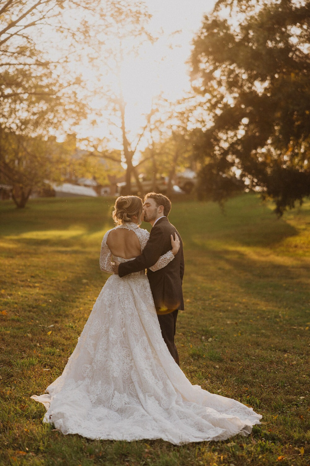 couple kisses during sunset for pre-wedding photos