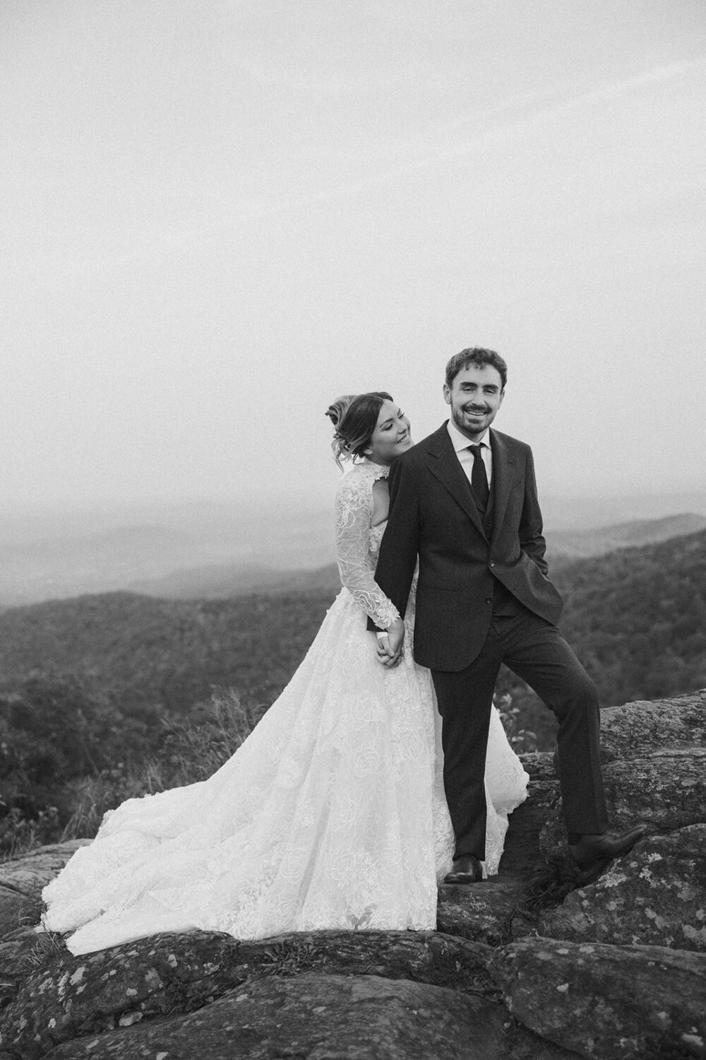 couple posing on rocks in Shenandoah National Park
