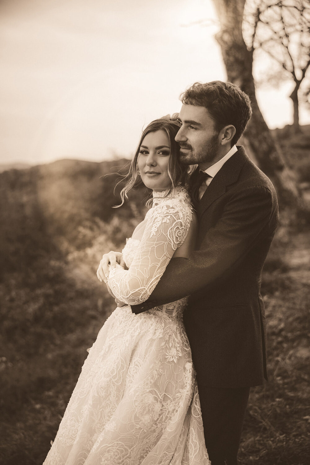 couple embraces during pre-wedding photos