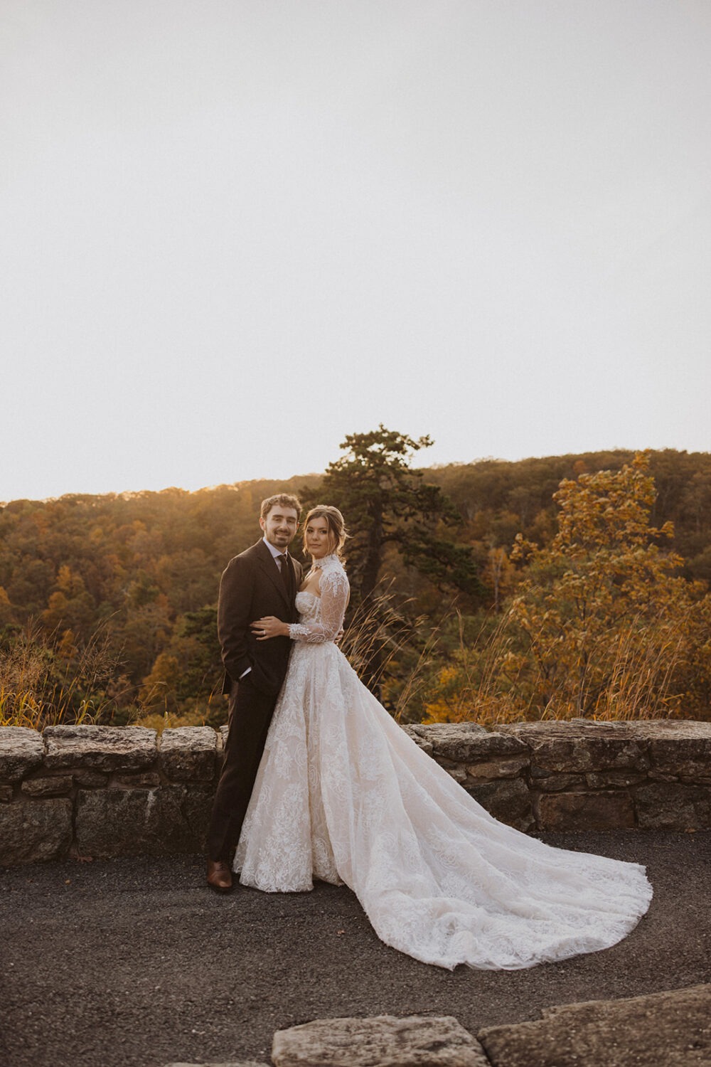 couple posing in front of rocky ledge at Shenandoah National Park Skyline Drive