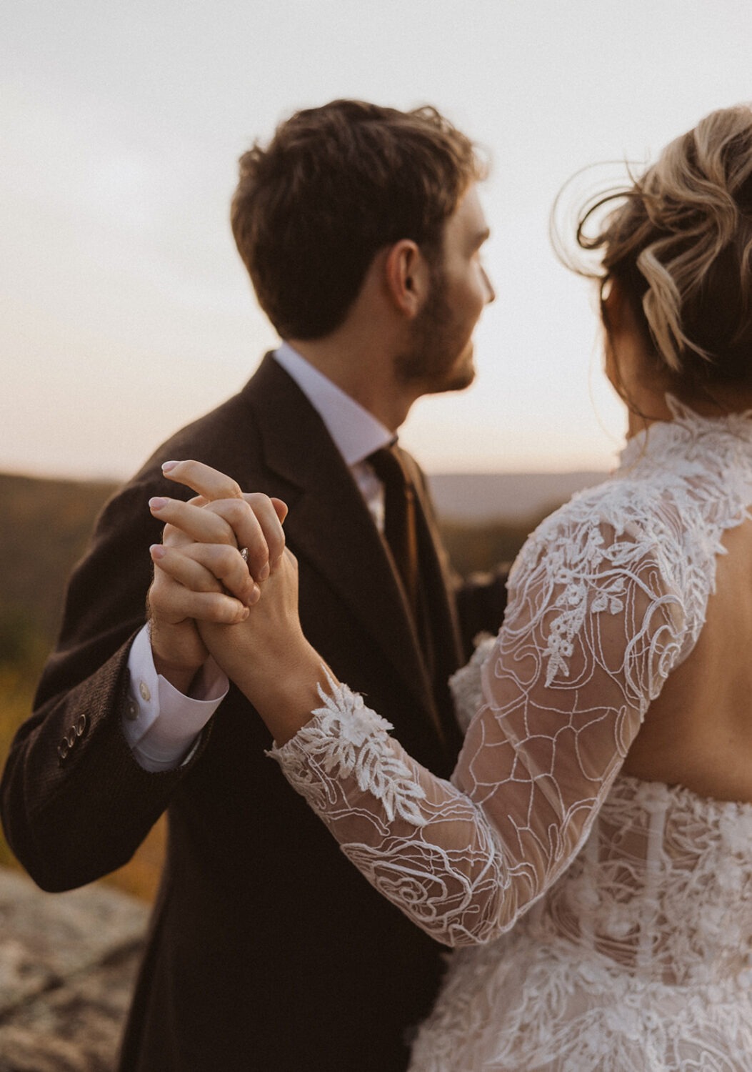 couple holding hands during pre-wedding photos