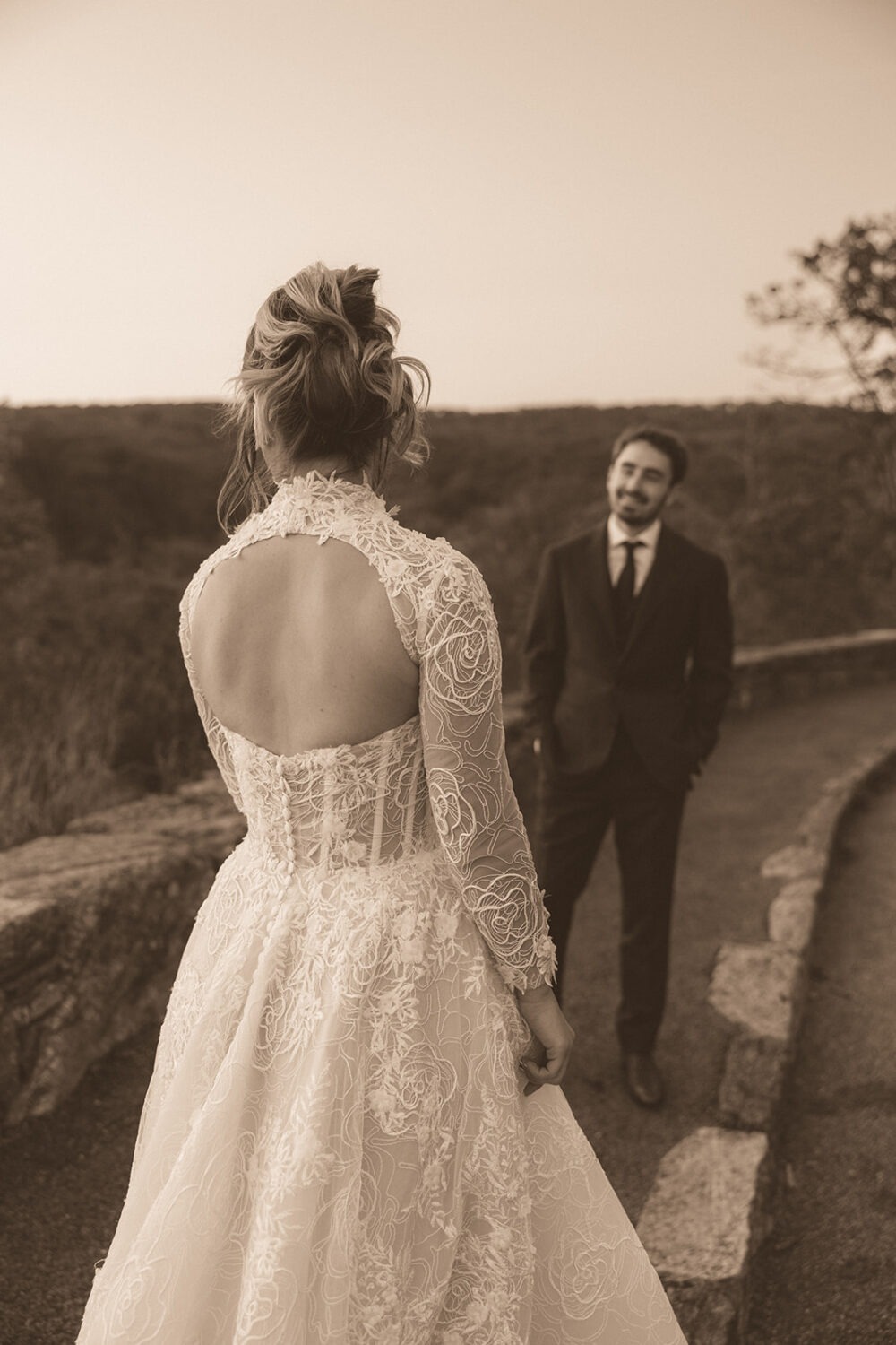 couple faces each other along path at Shenandoah skyline drive