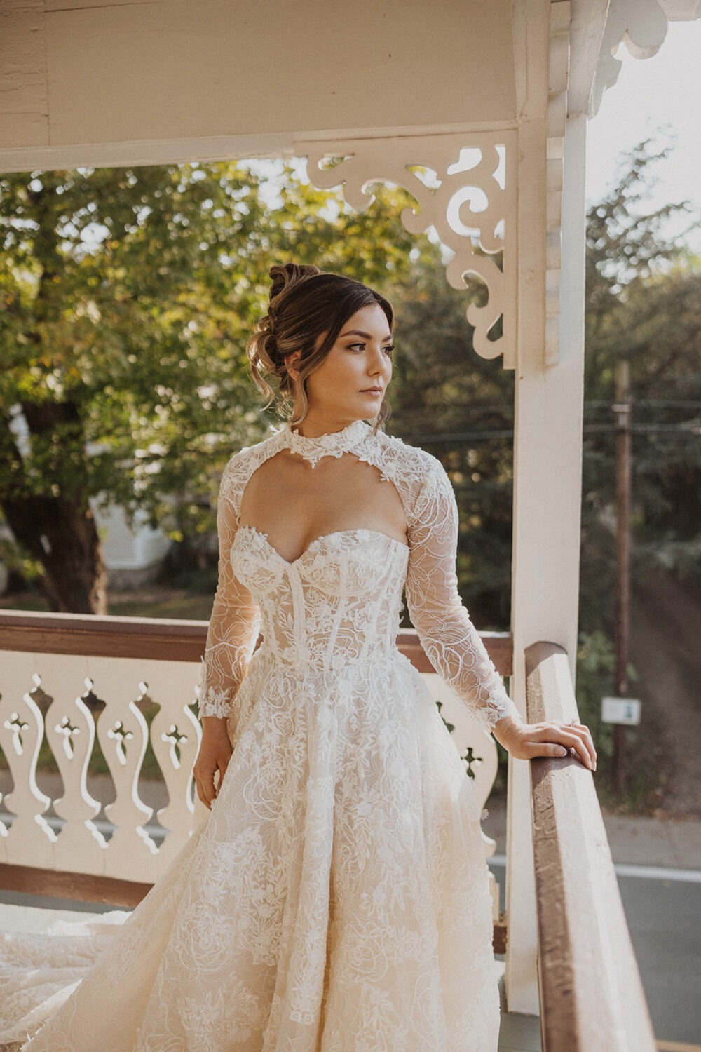 bridal portraits taken on bed and breakfast porch