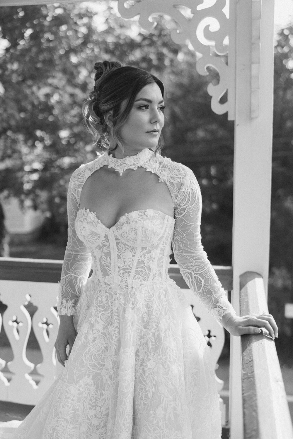 bridal portraits taken on bed and breakfast porch