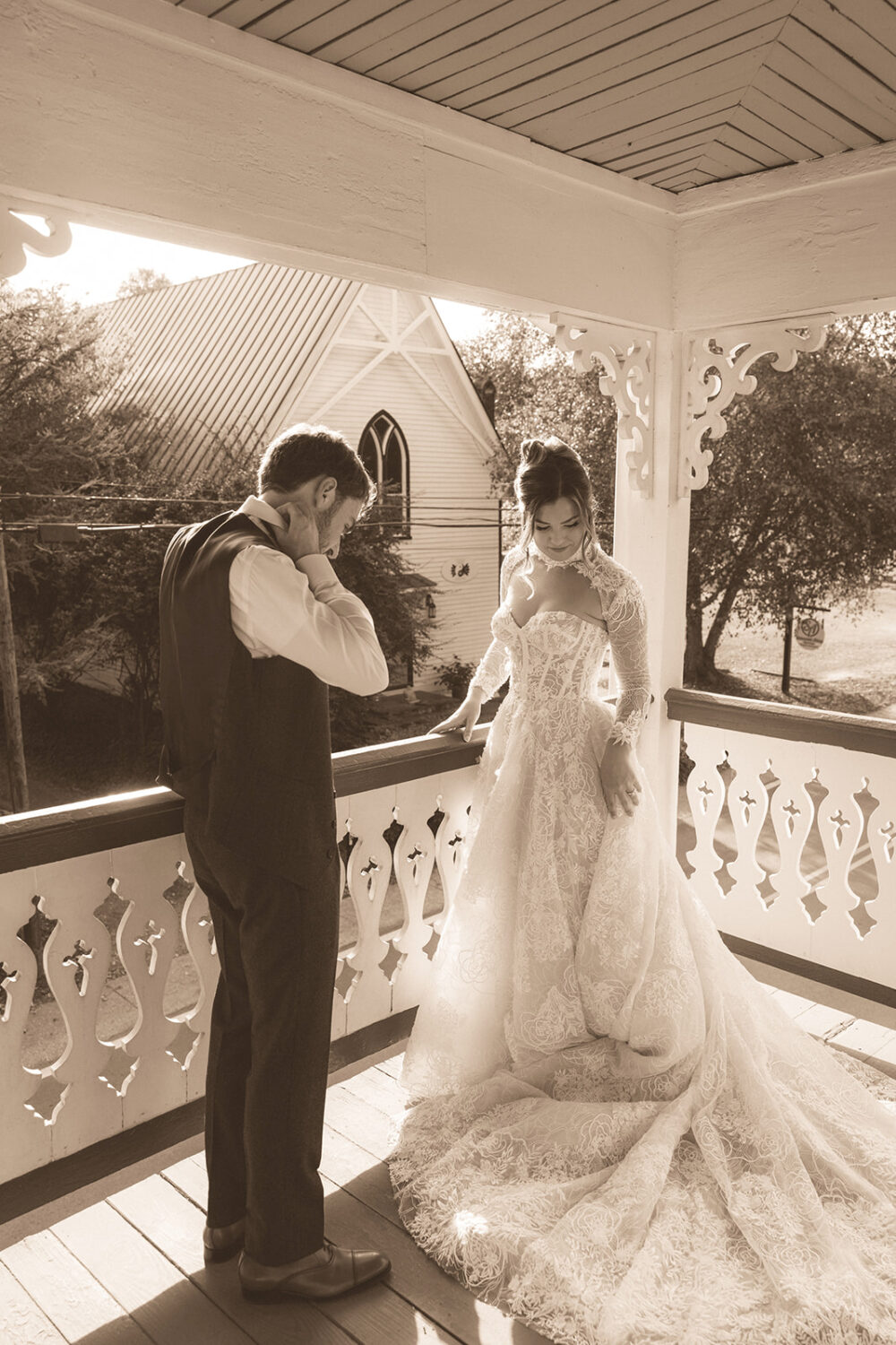 couple getting ready on porch for pre-wedding photos