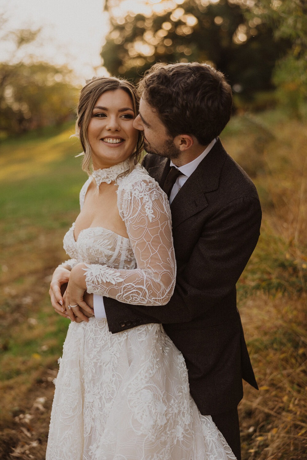 couple embraces during sunset for pre-wedding photos