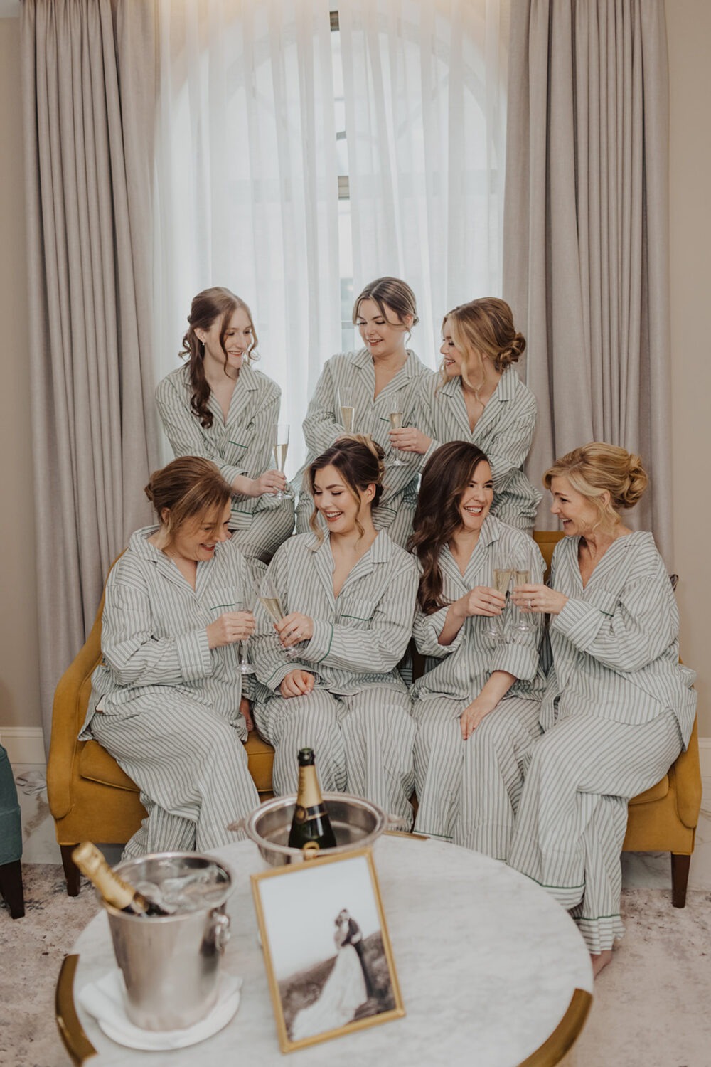 bridal party getting ready with champagne