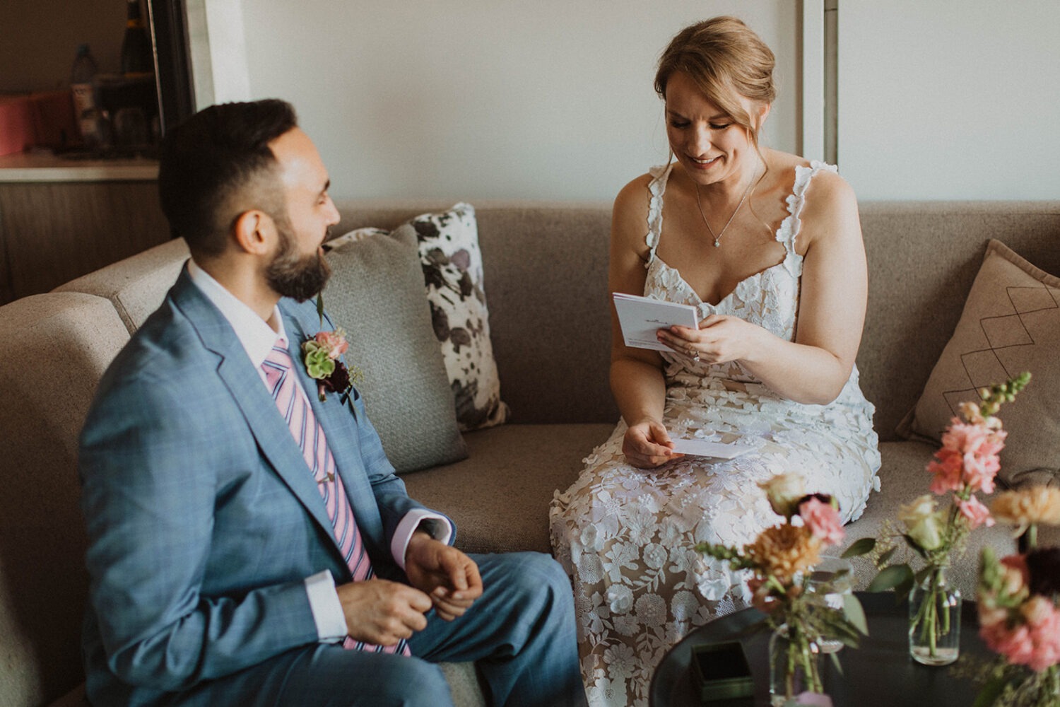 couple having a private moment reading cards from one another 
