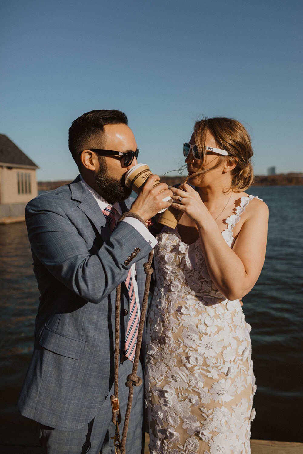 couple posing drinking coffee