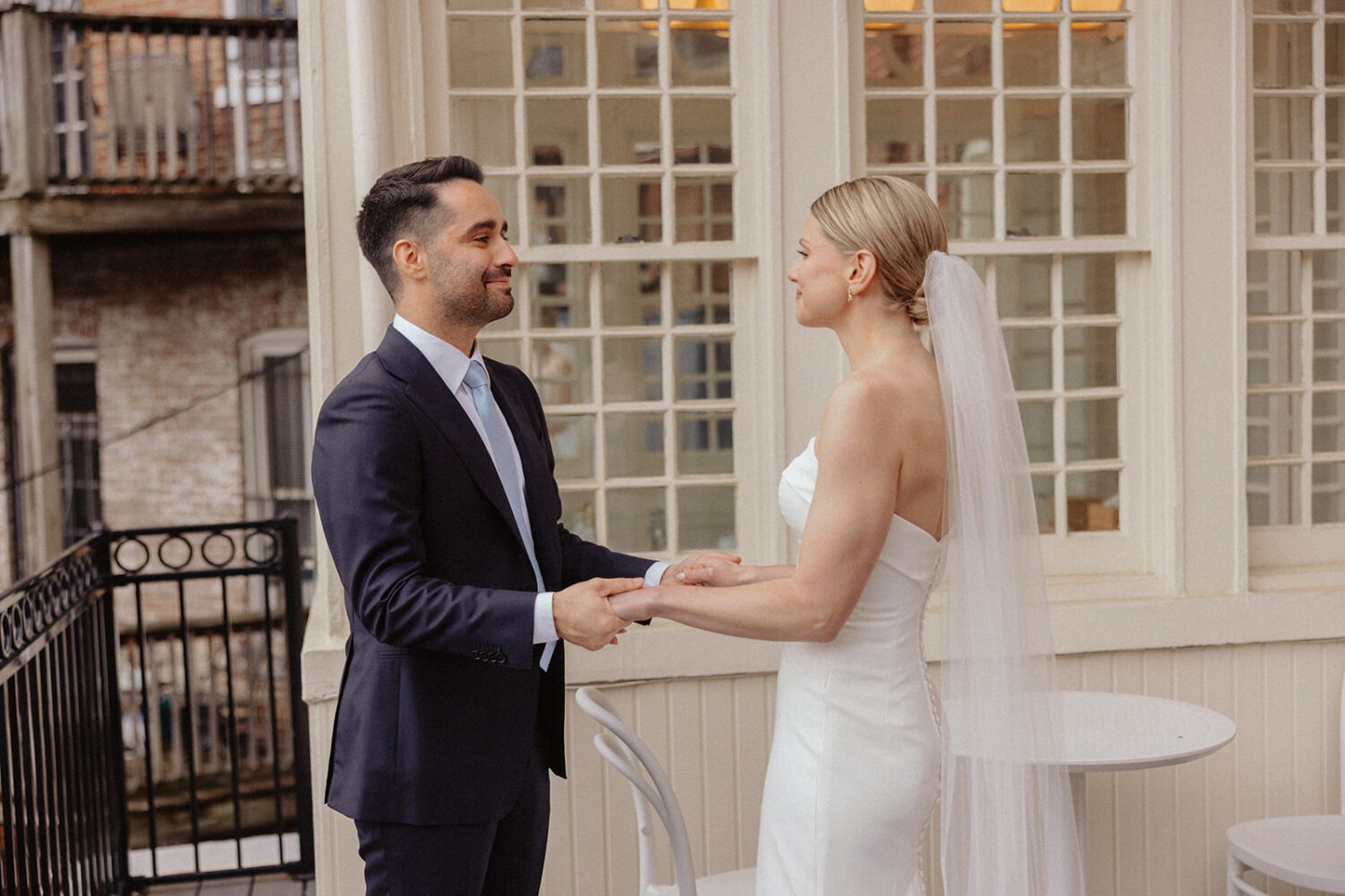 couple's first look on terrace of Swann House SC