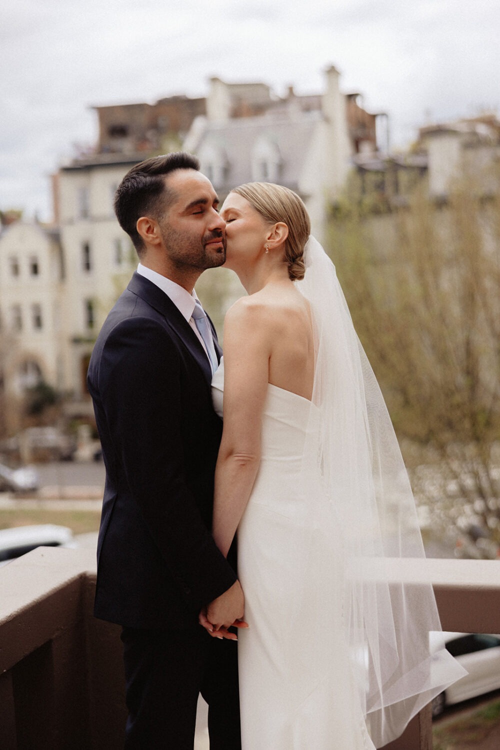 couple kissing on upper terrace at Swann House DC