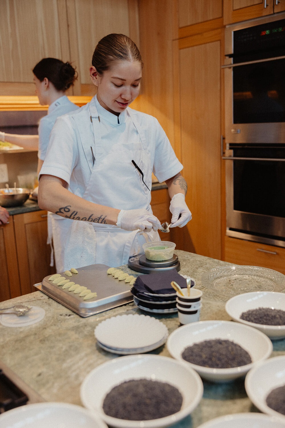 chef preparing the food for the wedding reception
