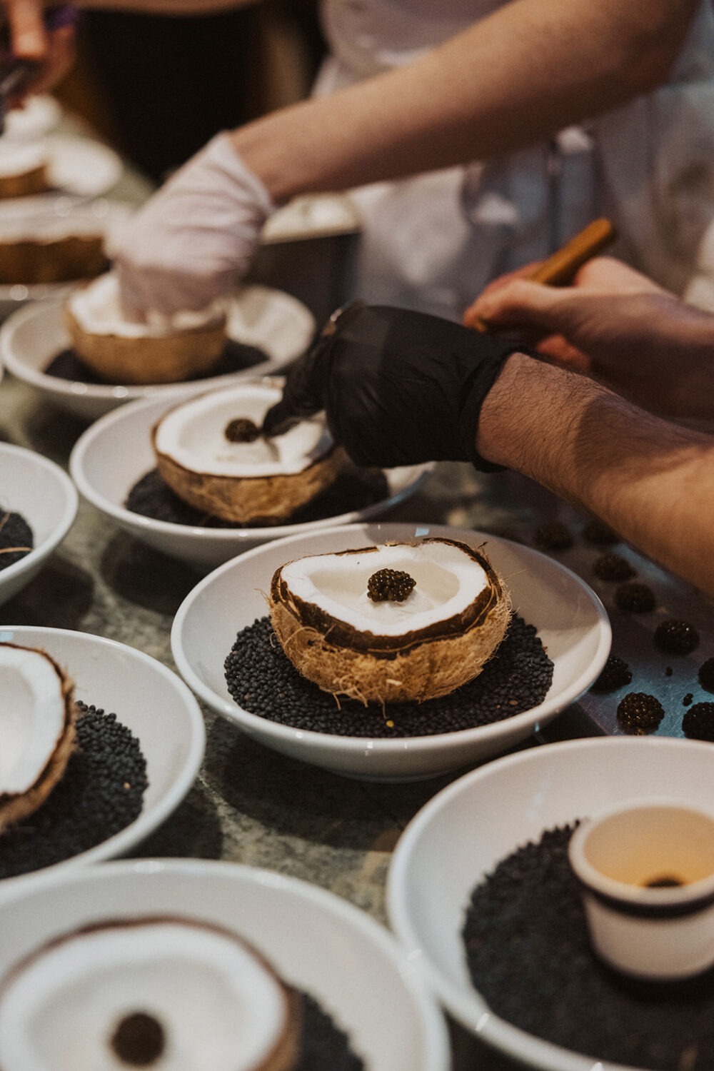 chef plating a gourmet dessert