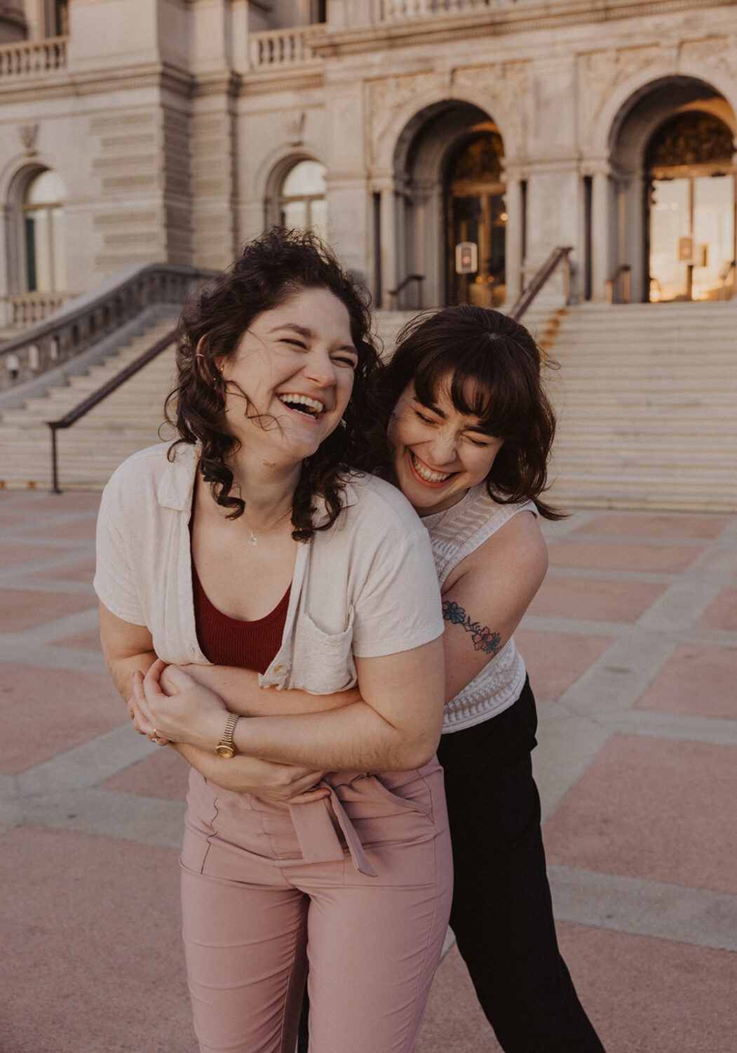 couple laugh and embrace during DC engagement photoshoot