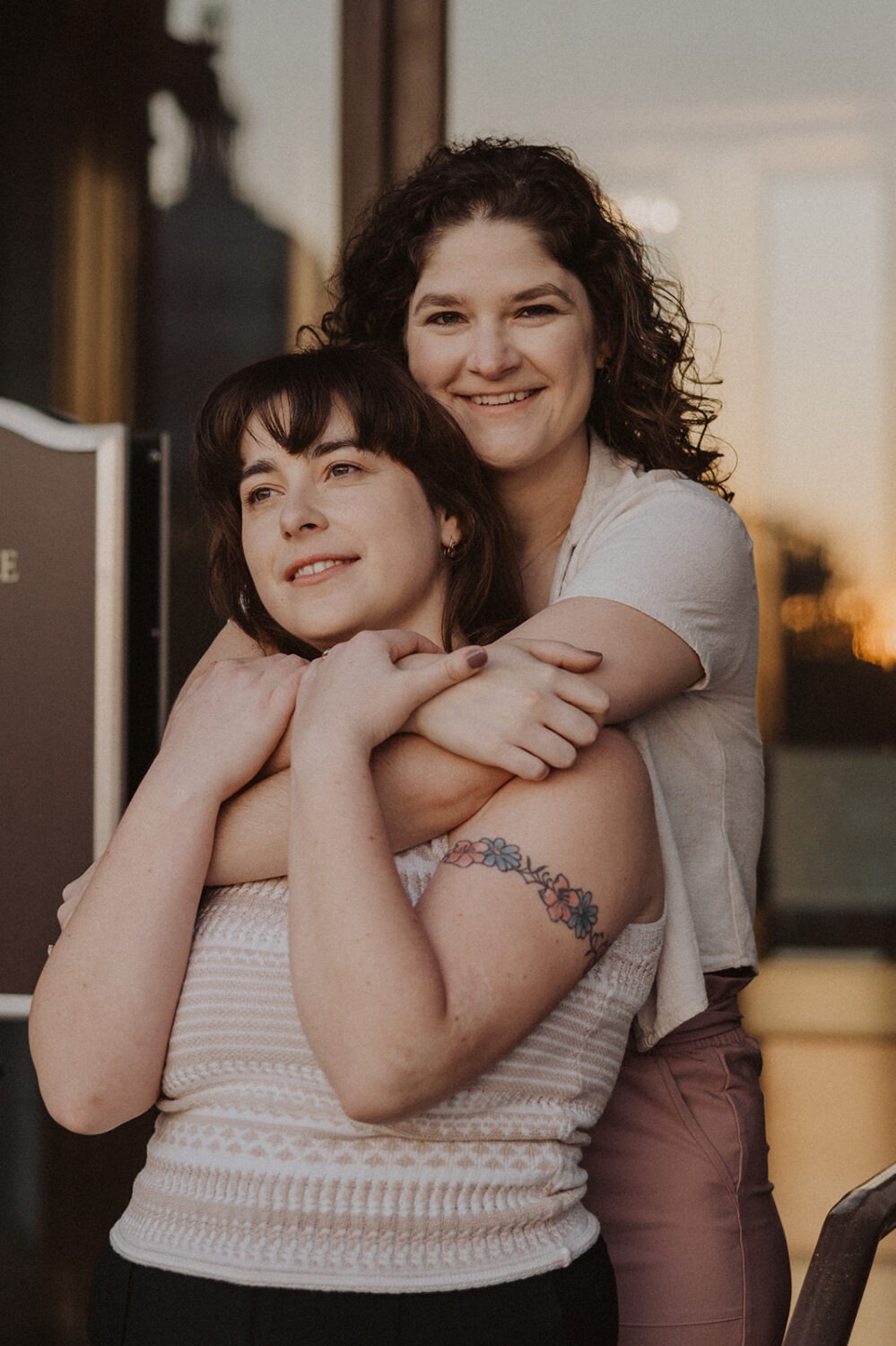 couple embrace during engagement photoshoot