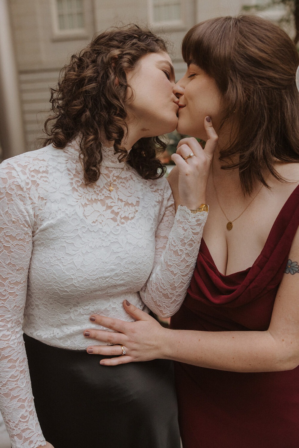 couple kiss during engagement photoshoot