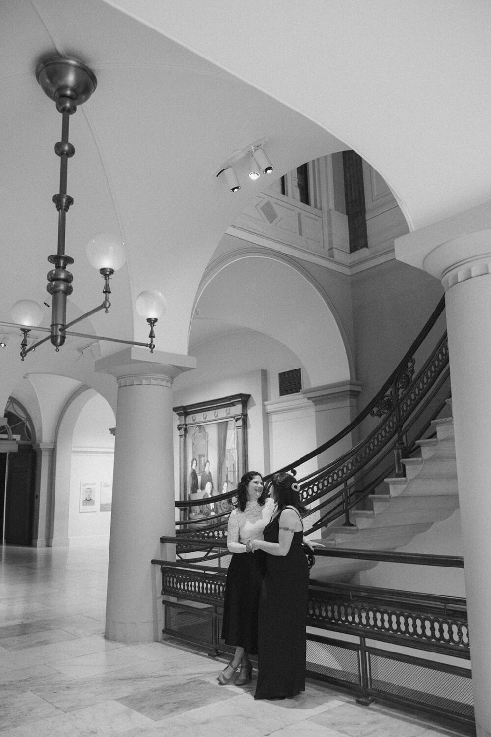 couple pose in the National Portrait Gallery 