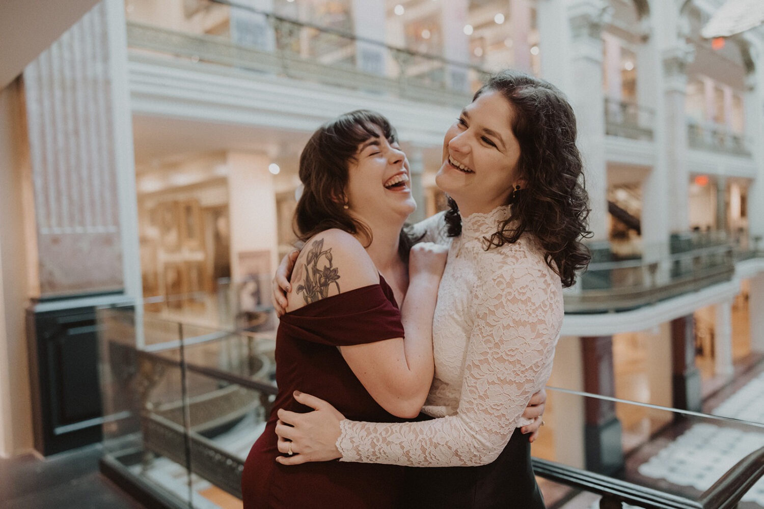 couple laughing together during engagement photoshoot