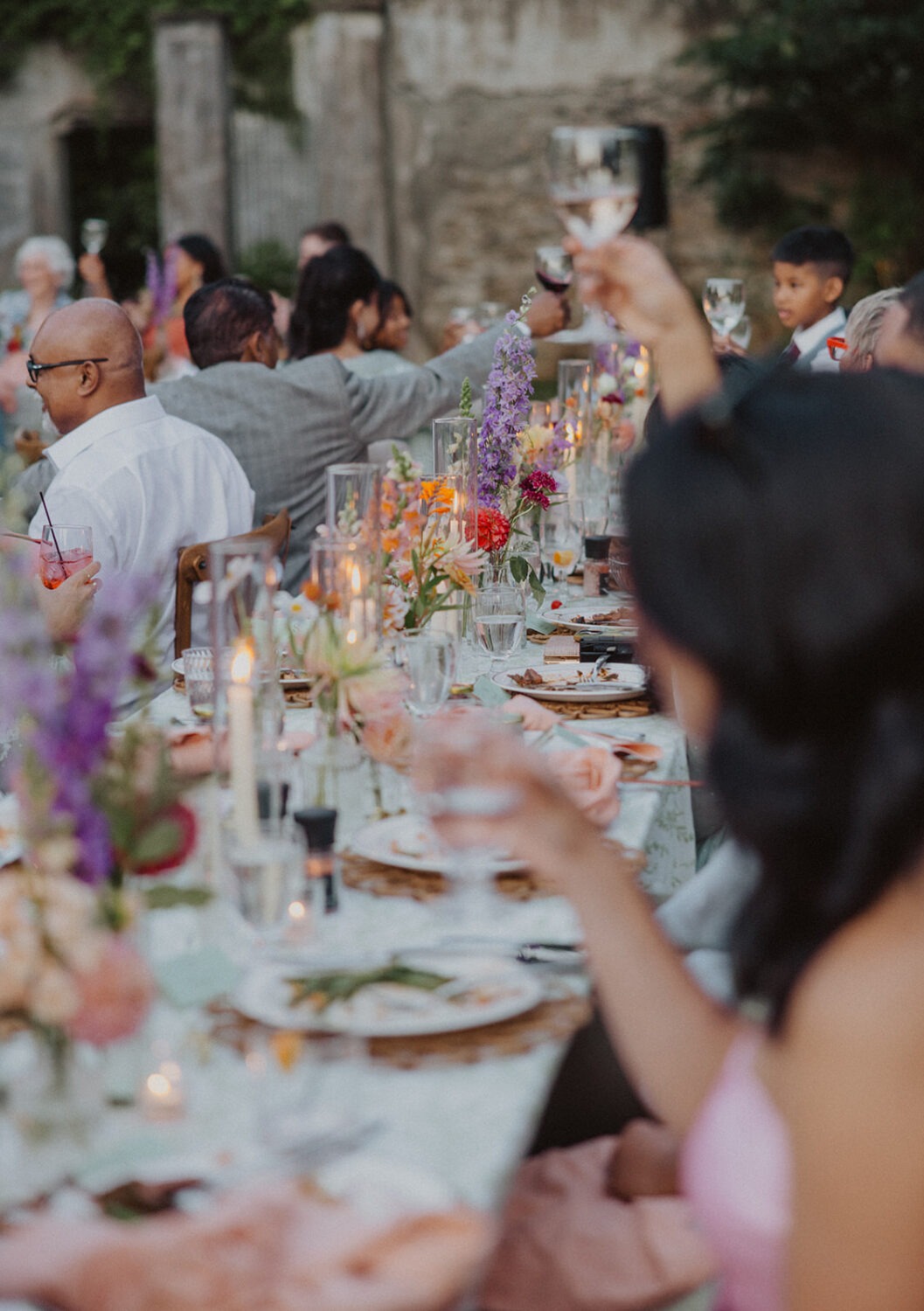 guests toast during reception speeches
