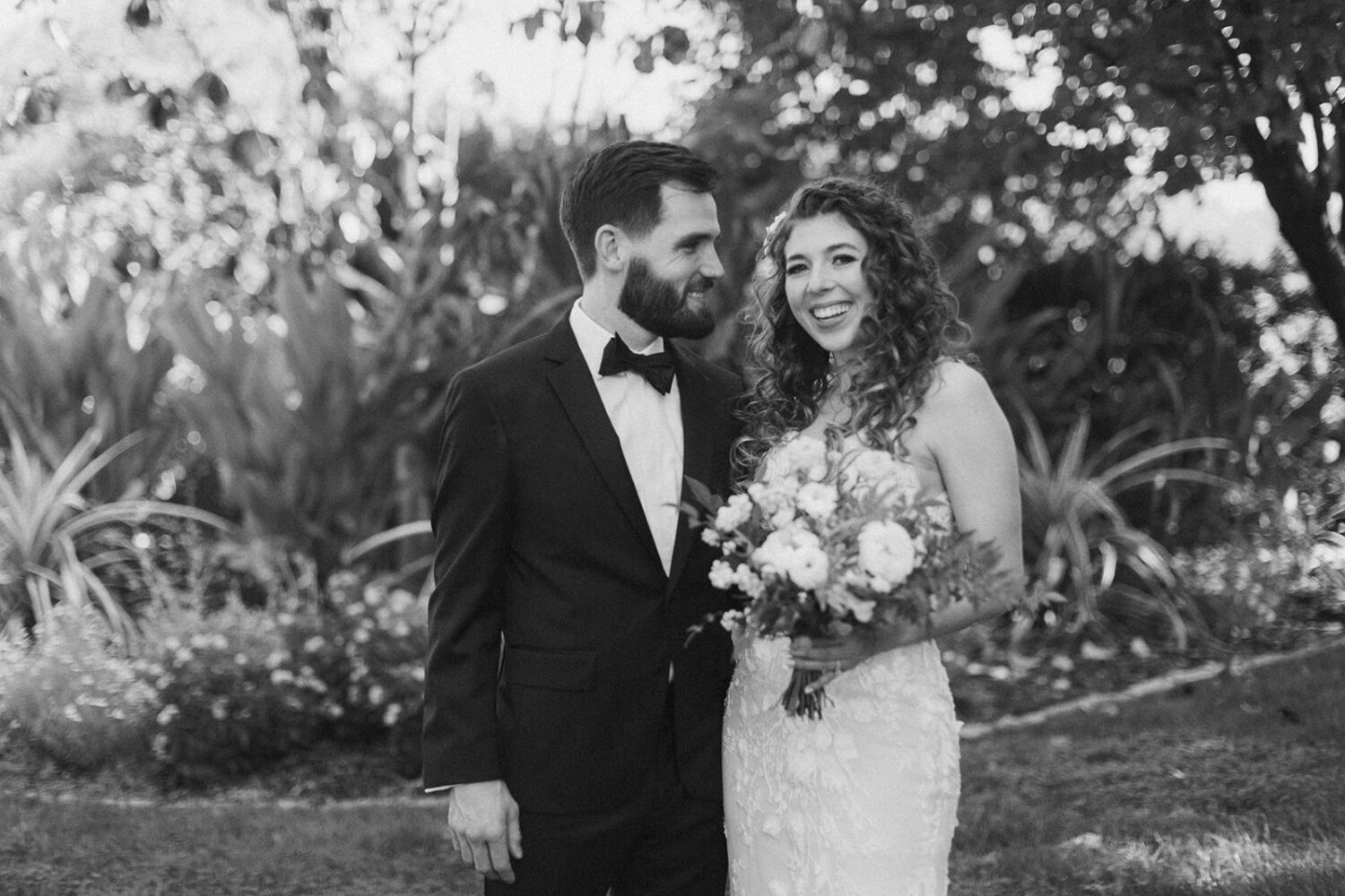 couple pose along path for portraits