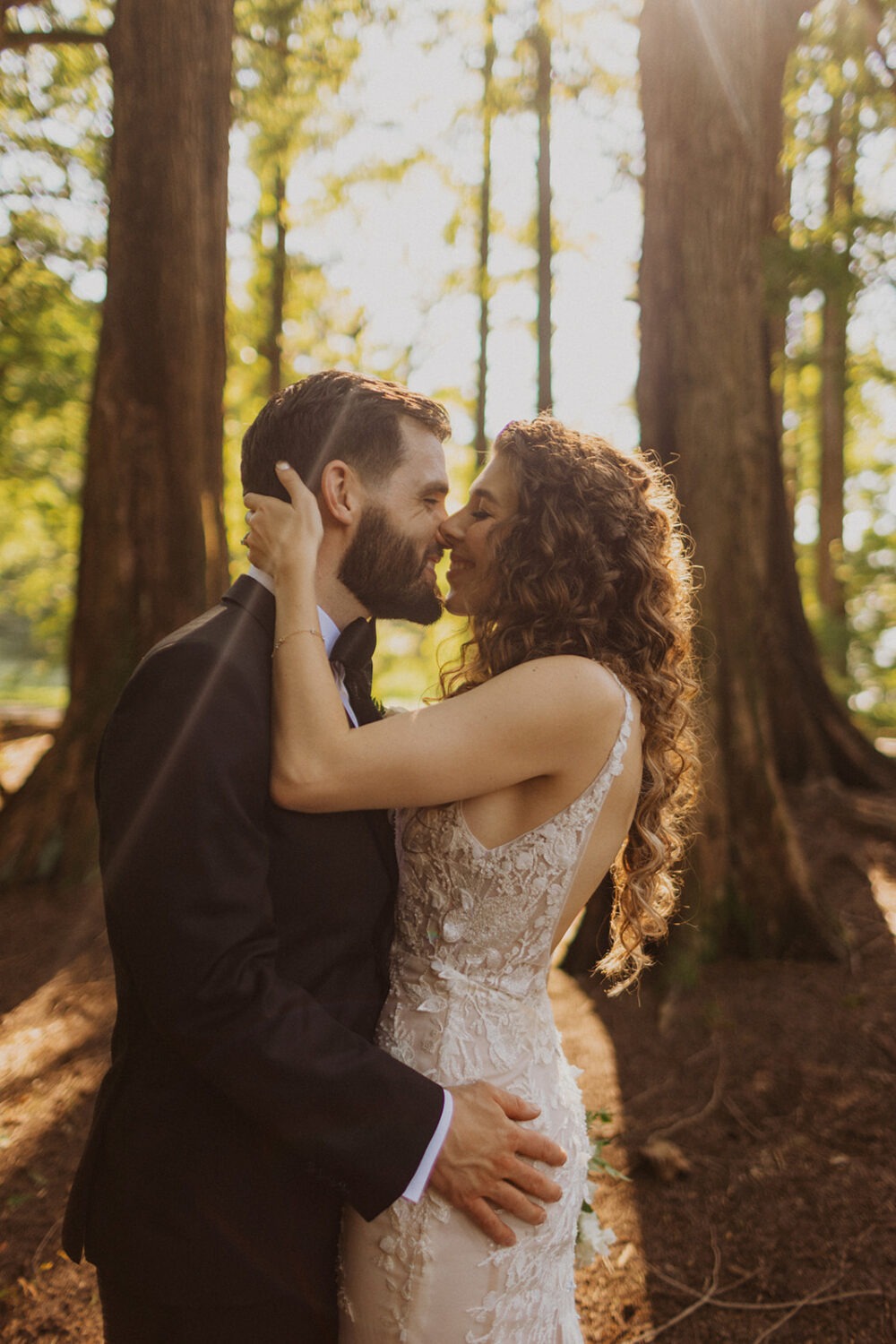 couple kiss during sunset 
