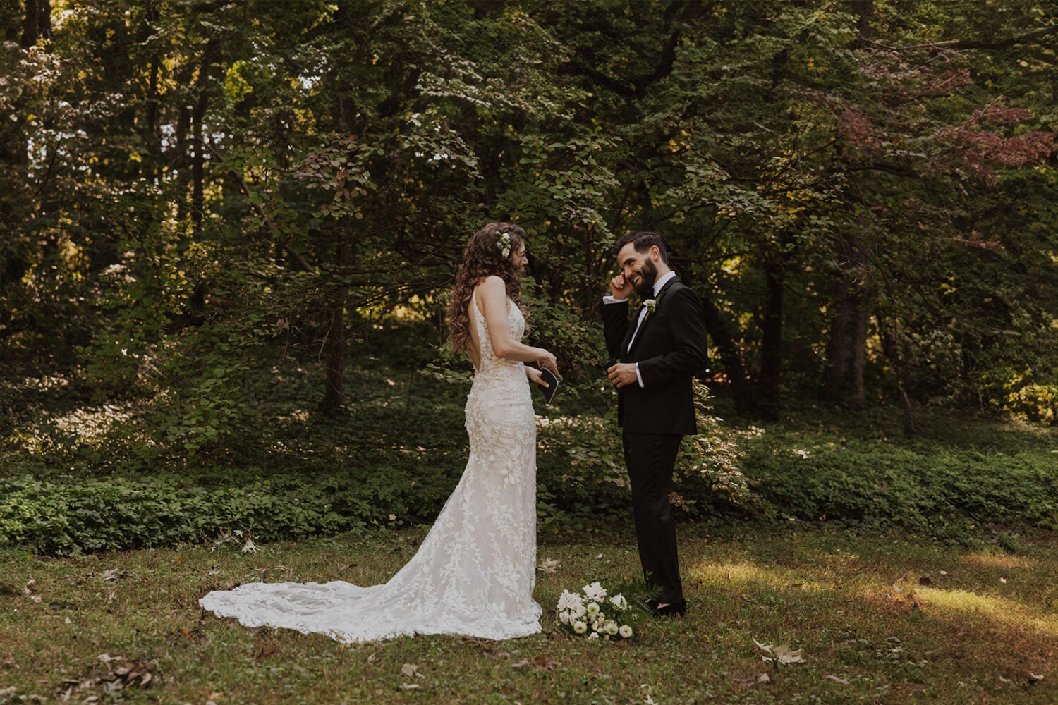couple reading private vows to each other 