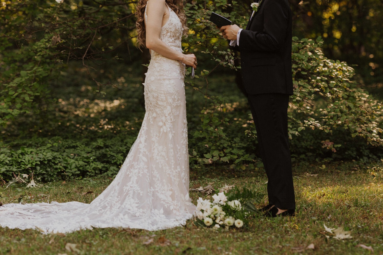 couple reading private vows to each other 
