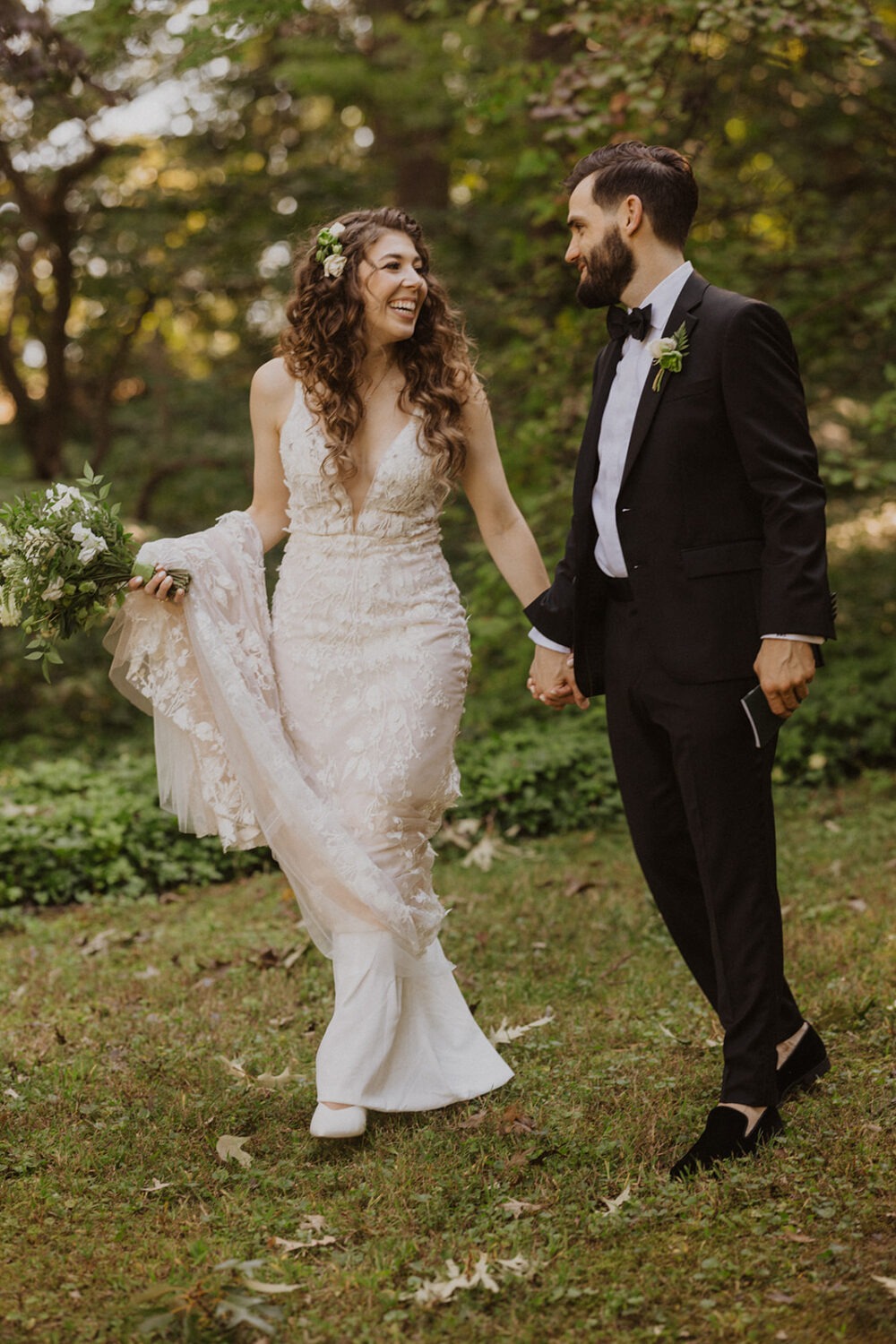 couple pose along path for portraits