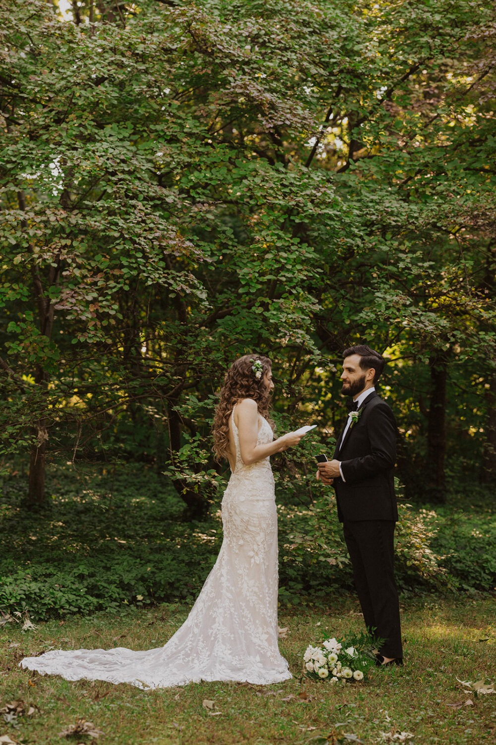 couple reads private vows to each other