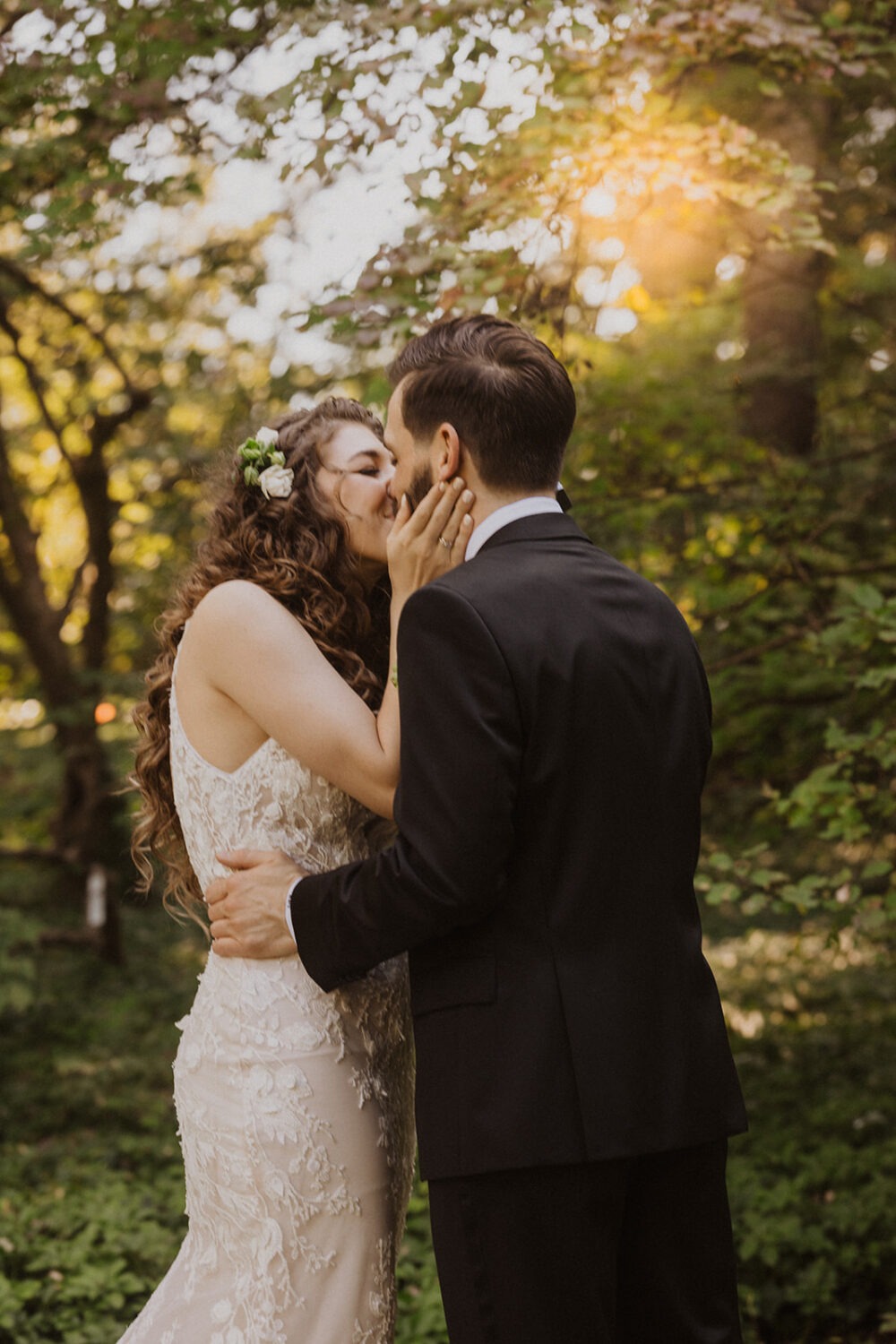 couple kiss during sunset
