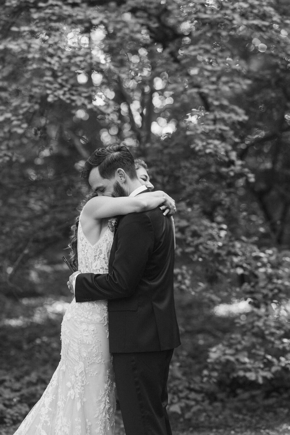couple embrace after their first look 
