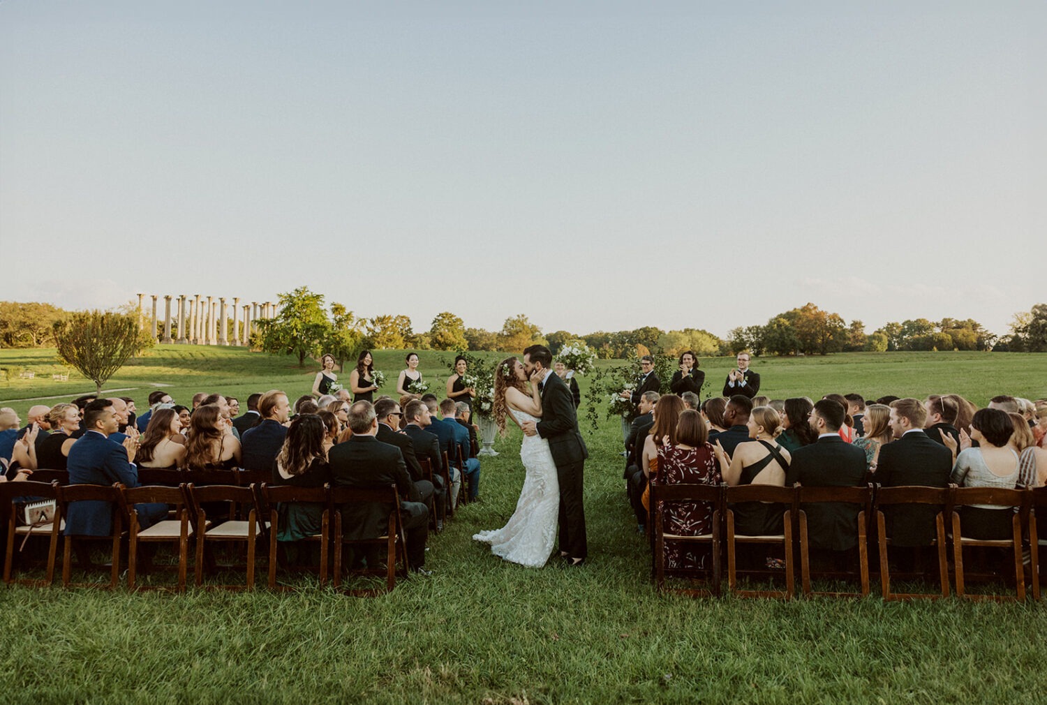 couple kiss after ceremony at National Arboretum wedding