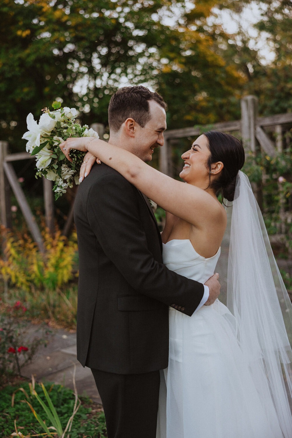 couple embrace in Herb Garden 
