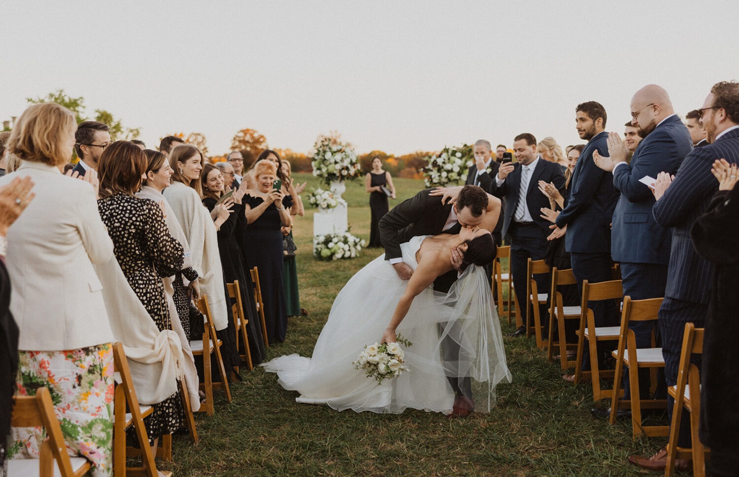 couple kiss after ceremony at National Arboretum wedding