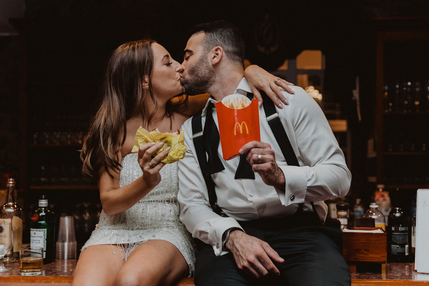 couple enjoying McDonalds during after party