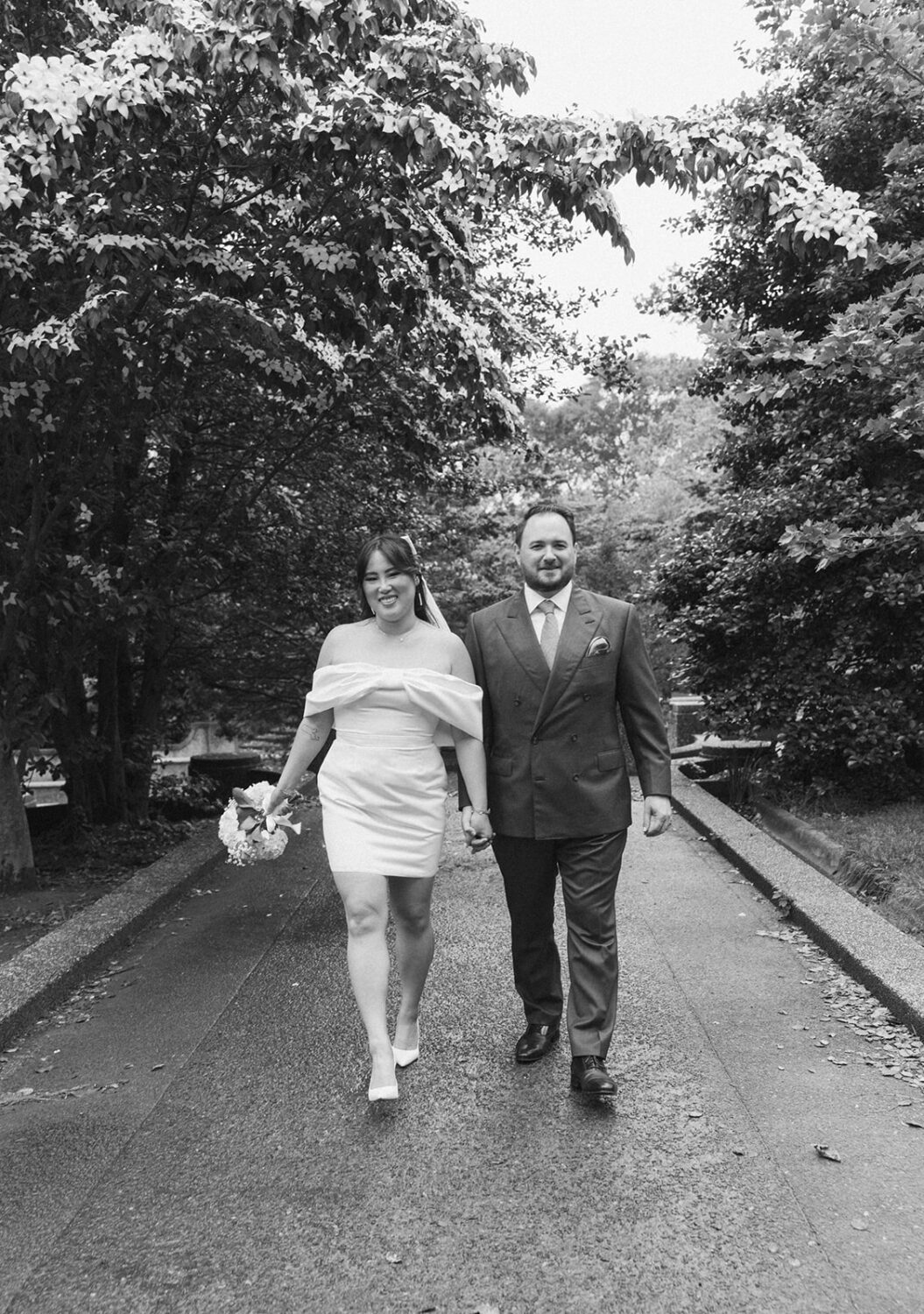 couple walking along path in Meridian Hill Park