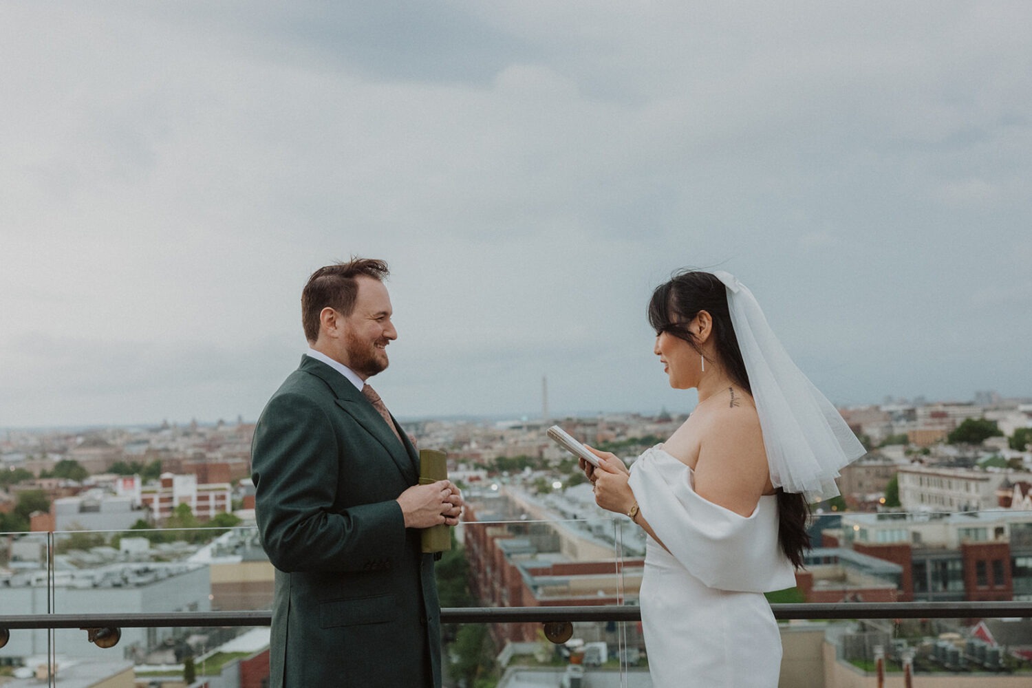 bride reads vows during rainy wedding day