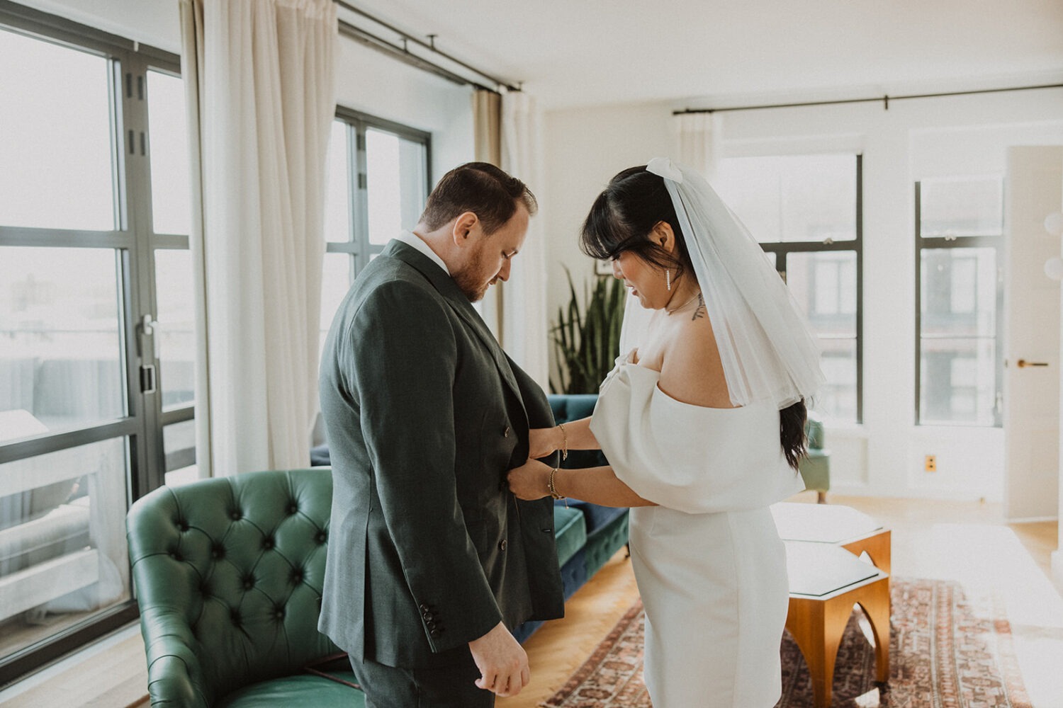 couple help each other getting ready in the Line hotel