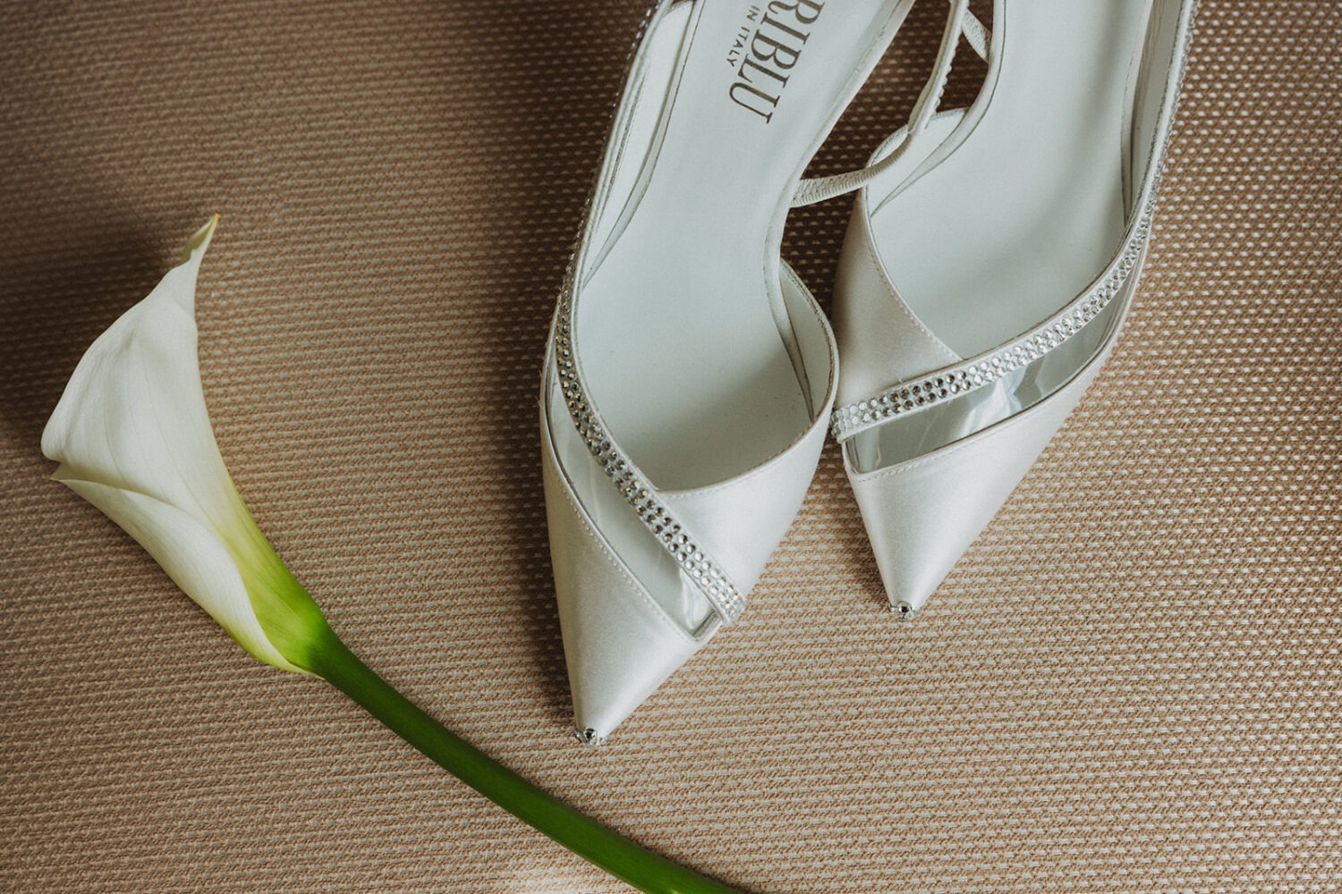 bridal shoes and flower