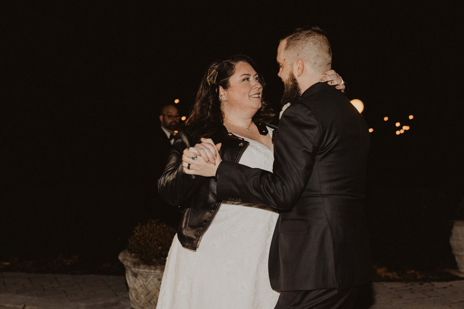 couple's first dance outside in the winter night