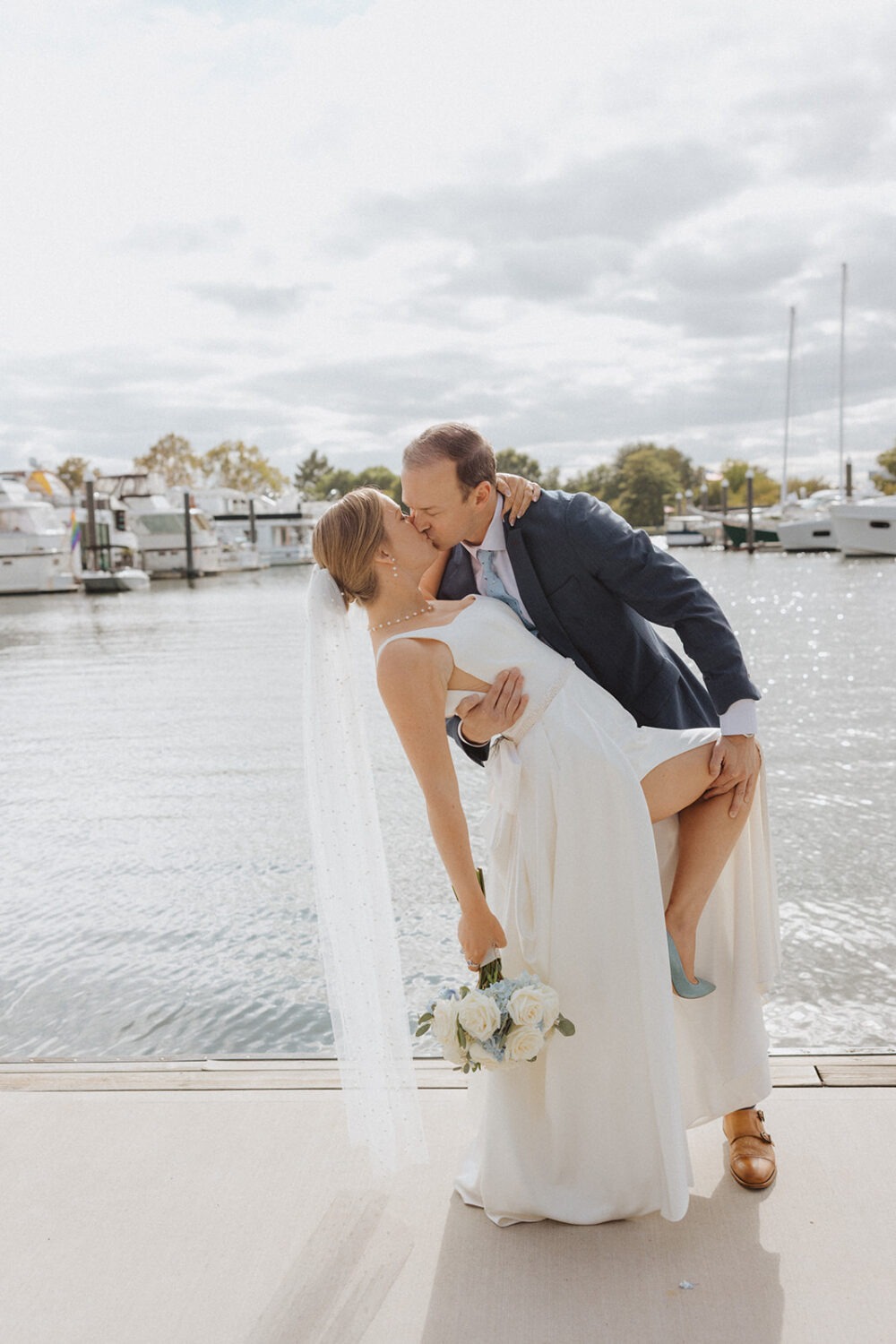 couple kiss on the boating dock in Washington DC
