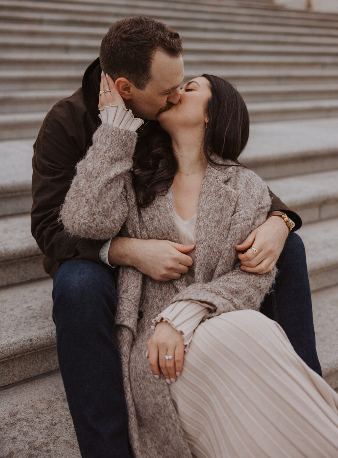 couple kiss on the steps of Capitol Hill DC