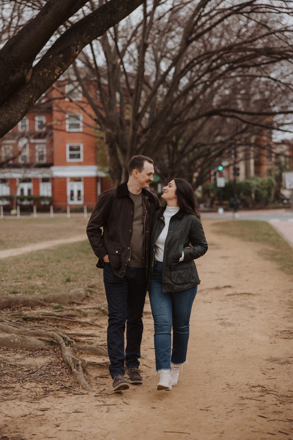 couple walk along path in Lincoln Park 
