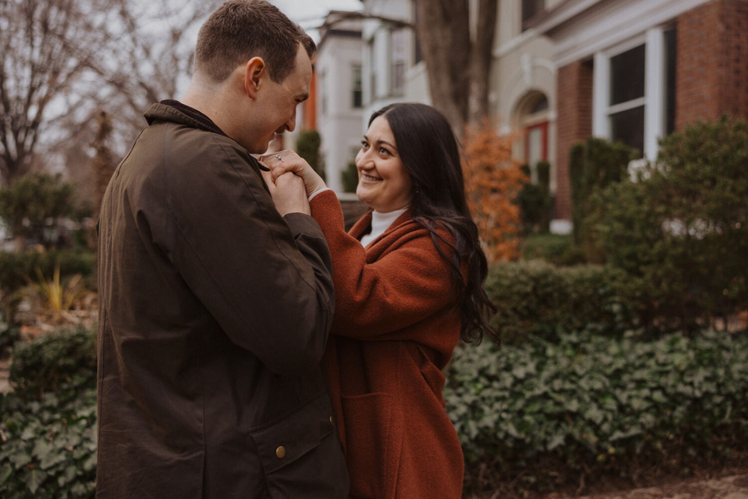 couple pose in their Washington DC neighborhood